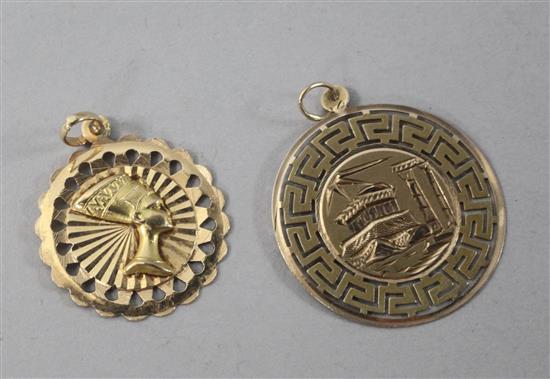 An 18ct gold pendant with the head of Nefertiti and a yellow metal pendant engraved with longboat.